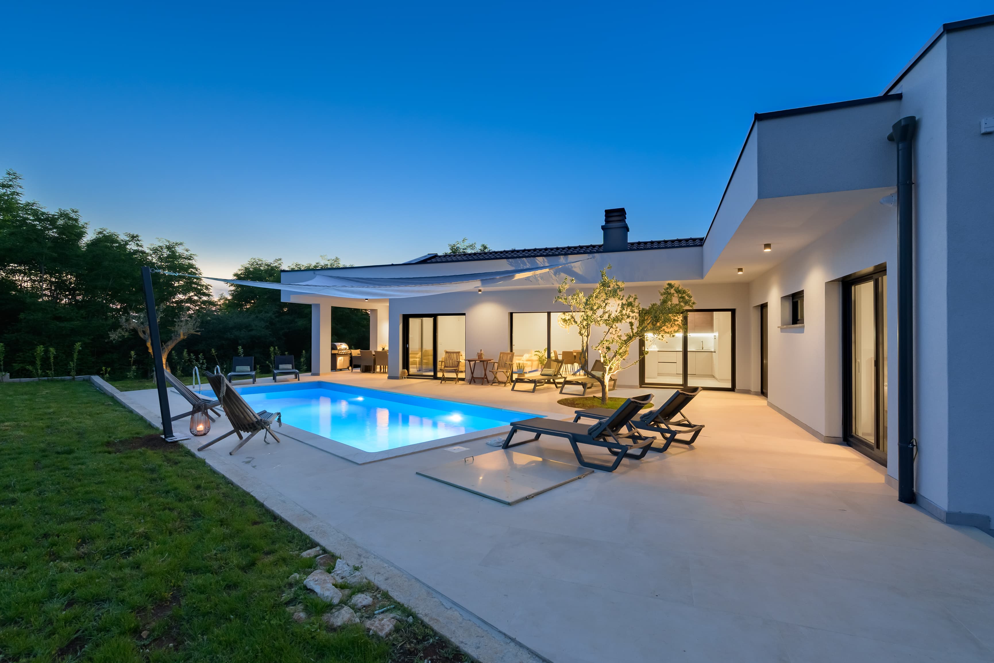 Villa Lim Silent with heated pool at dusk